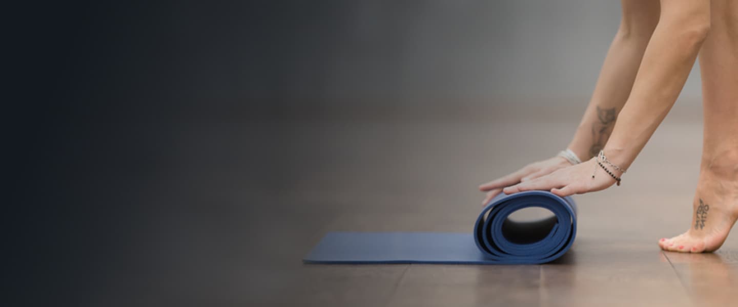 Yoga mat being prepared for practice